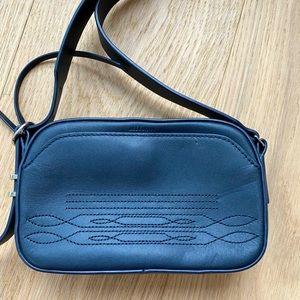 Allsaints navy mini crossbody leather bag.
